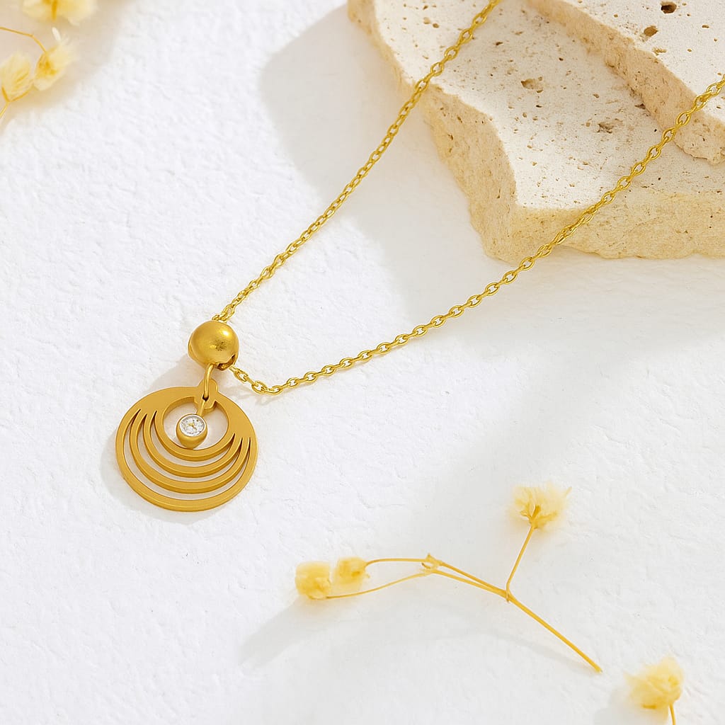 Gold necklace with a circular pendant
Stylish gold pendant
Everyday gold necklace
Simple round pendant
CZ stone necklace
Artificial jewellery for women