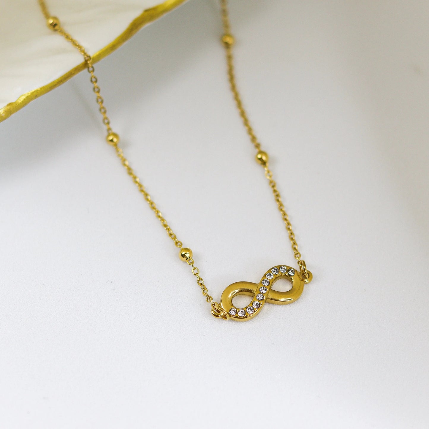 Saiyra Studded Infinity Gold-Plated Necklace