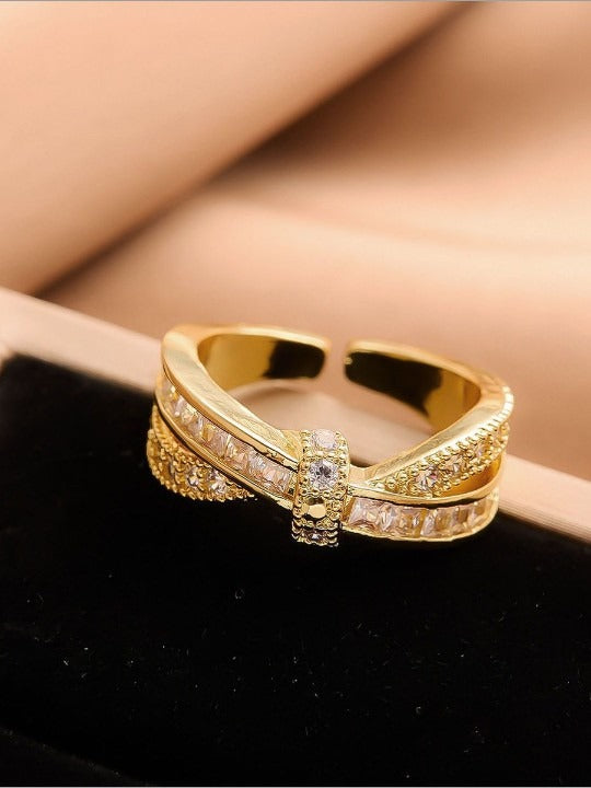 Gold ring with diamond accents
closeup of Saiyra ring
stylish anti-tarnish ring
bridal imitation ring
shiny gold-tone ring
designer ring display